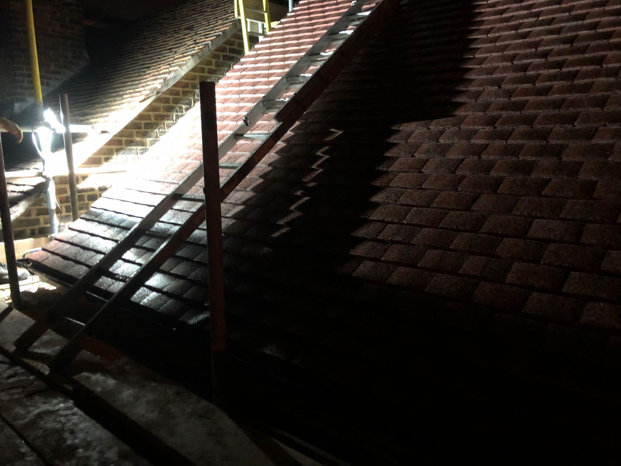 Professional roofers working on a property in London - KS Roof Master