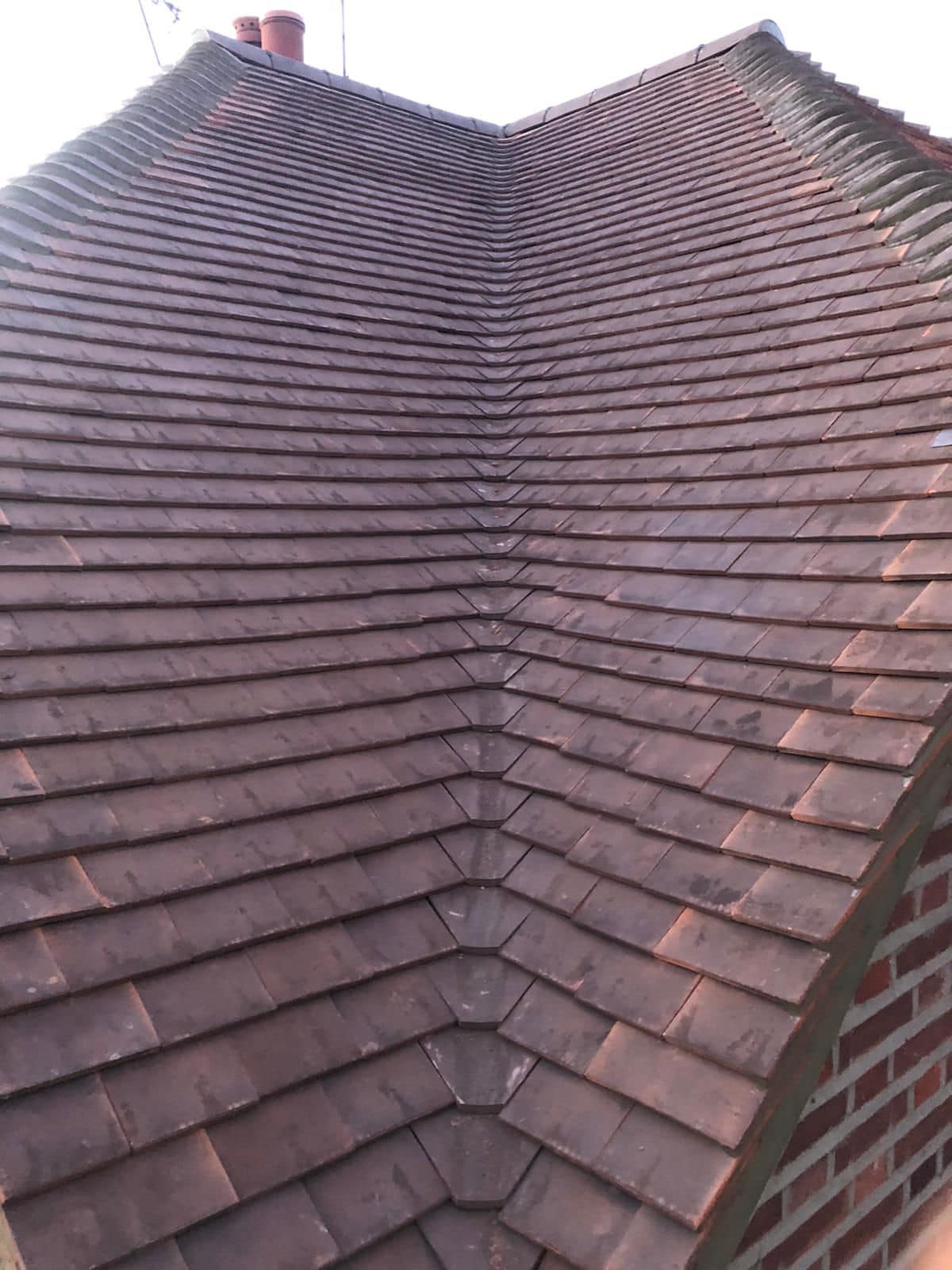Professional roofers working on a property in London - KS Roof Master