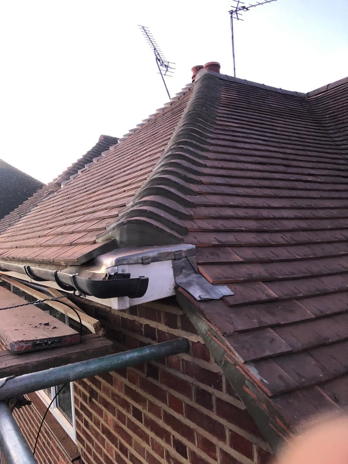 Professional roofers working on a property in London - KS Roof Master