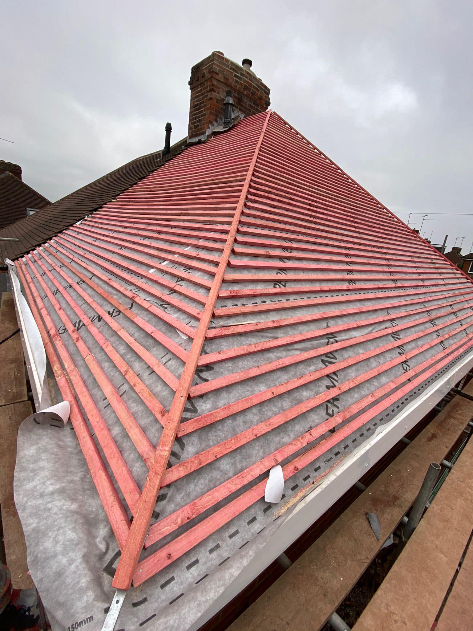Professional roofers working on a property in London - KS Roof Master