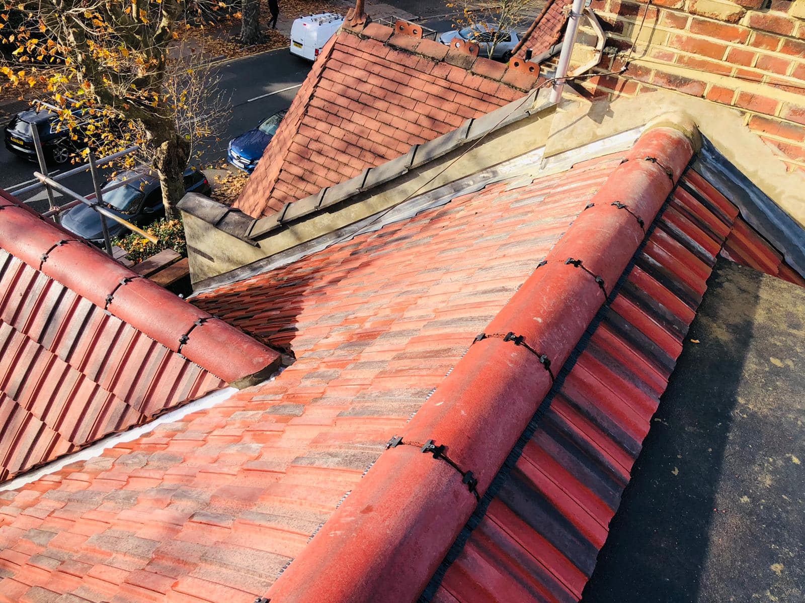 Professional roofers working on a property in London - KS Roof Master