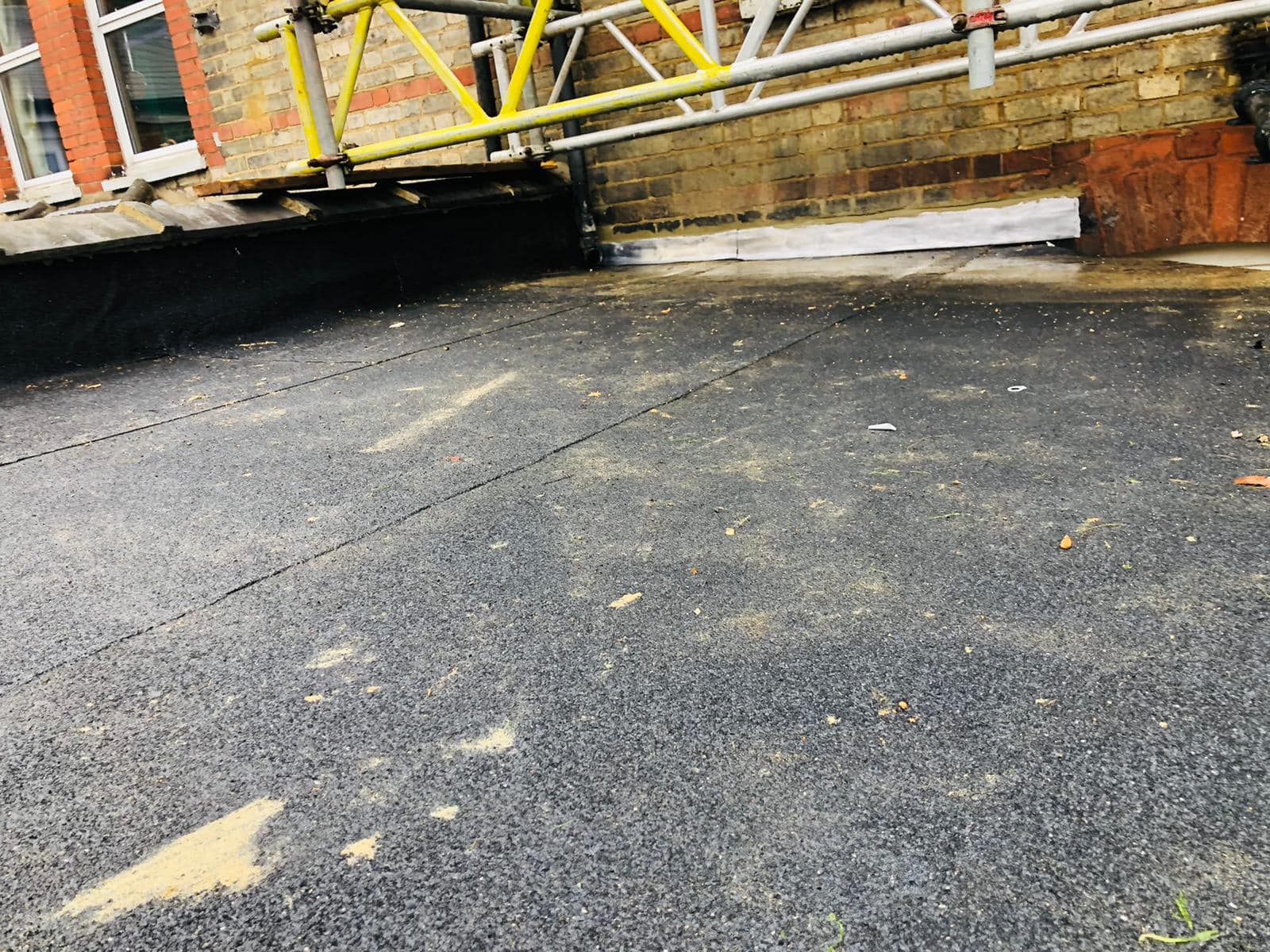 Professional roofers working on a property in London - KS Roof Master