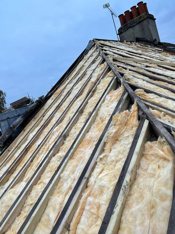 Professional roofers working on a property in London - KS Roof Master