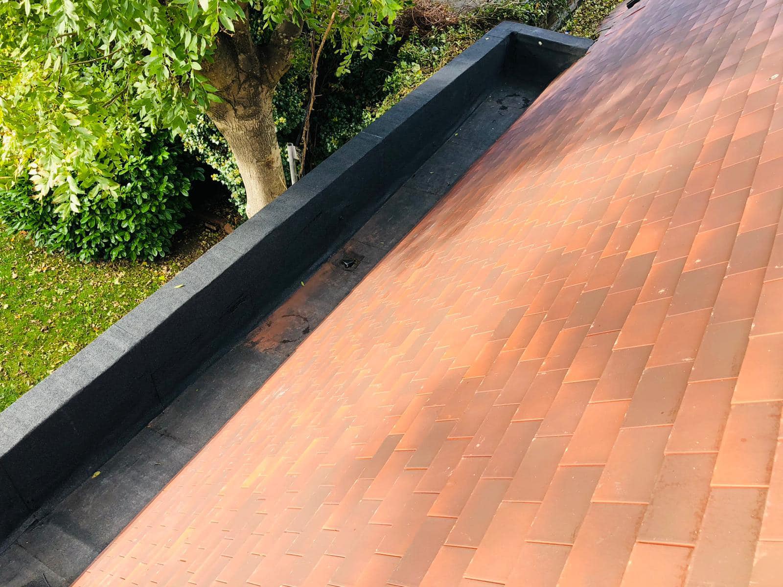 Professional roofers working on a property in London - KS Roof Master