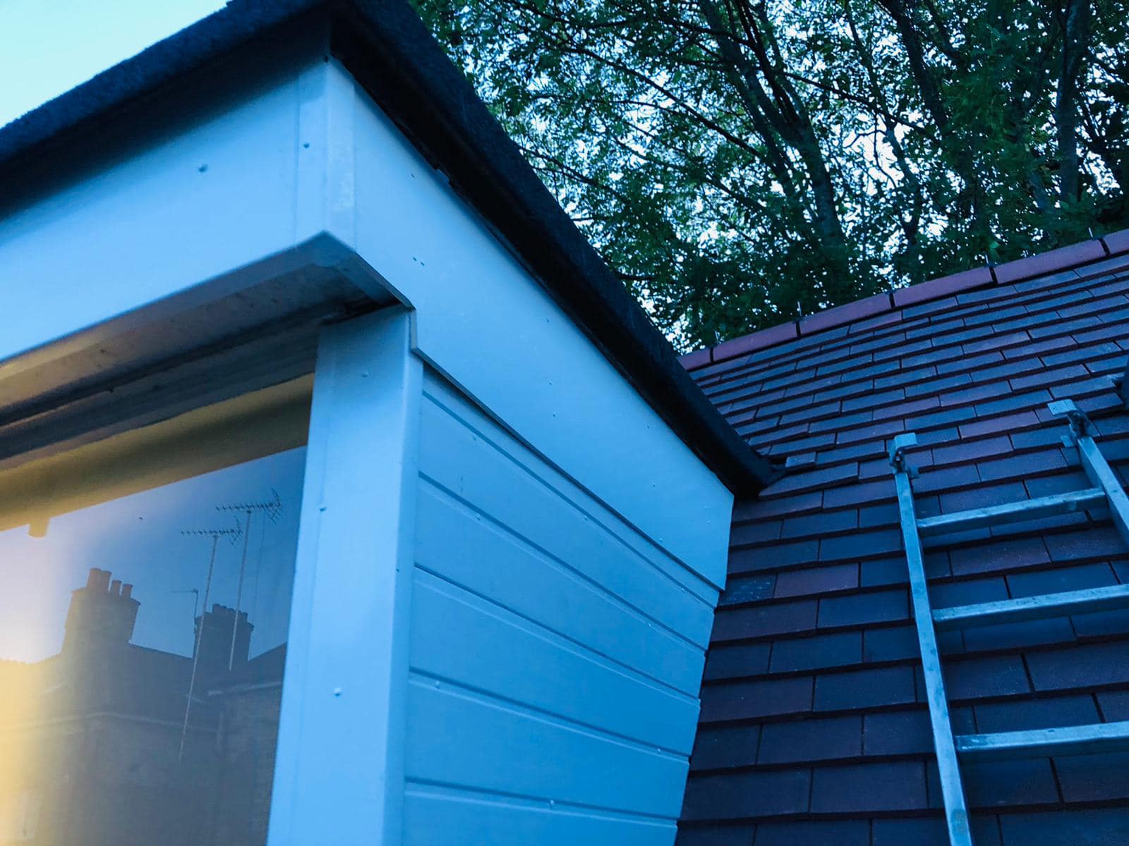 Professional roofers working on a property in London - KS Roof Master