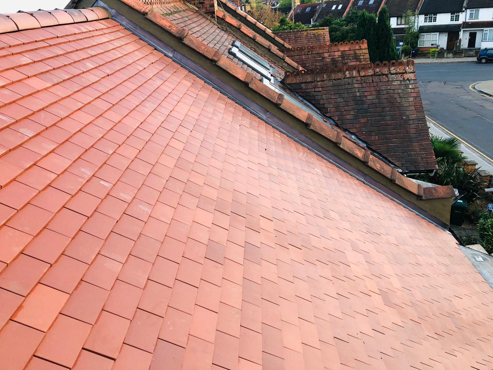 Professional roofers working on a property in London - KS Roof Master