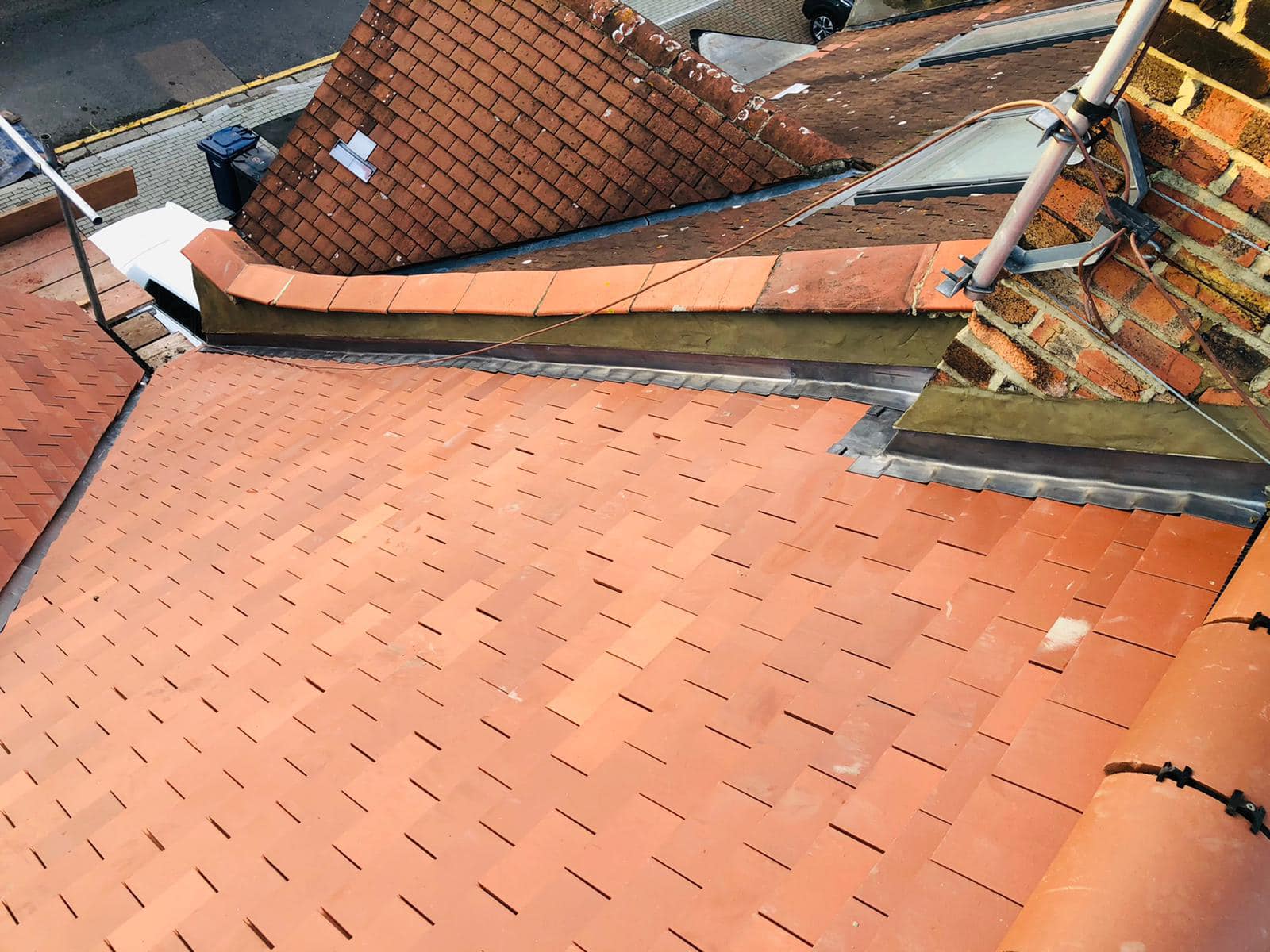 Professional roofers working on a property in London - KS Roof Master
