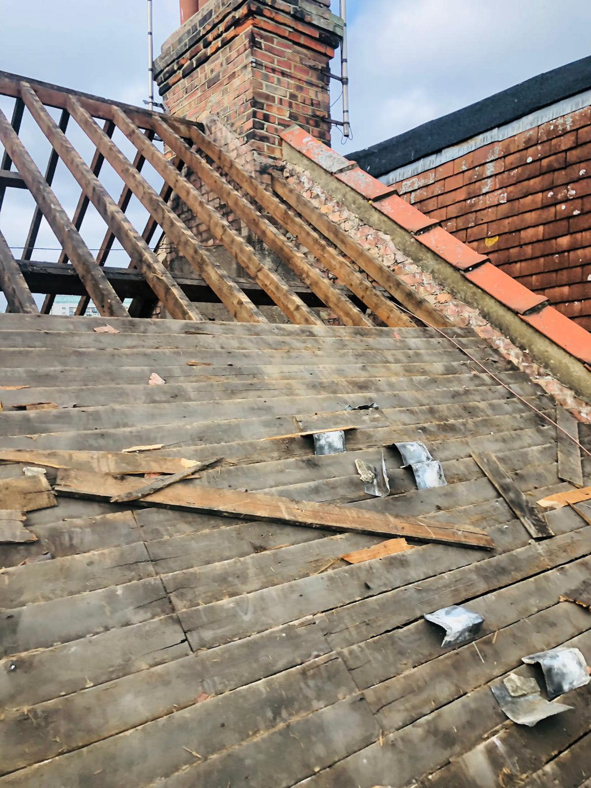 Professional roofers working on a property in London - KS Roof Master