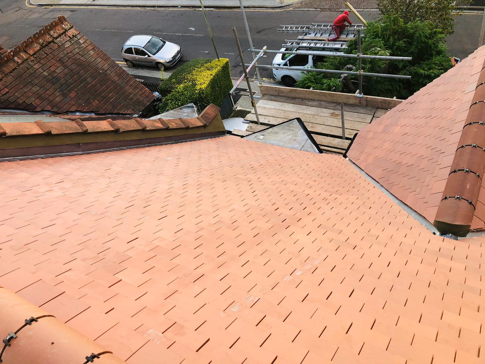 Professional roofers working on a property in London - KS Roof Master