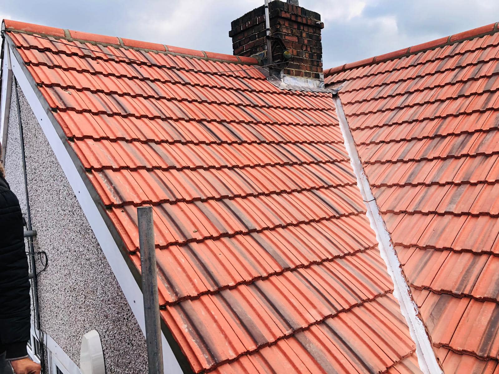 Professional roofers working on a property in London - KS Roof Master