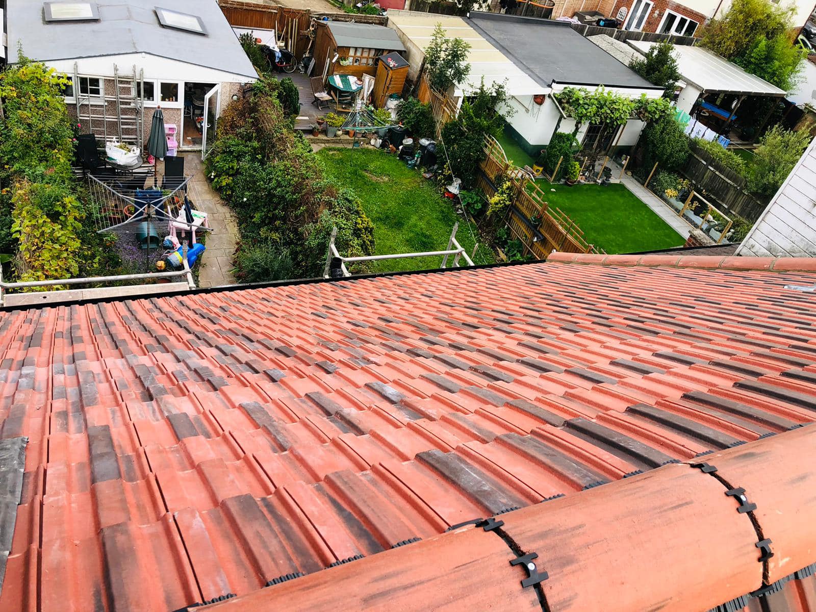 Professional roofers working on a property in London - KS Roof Master