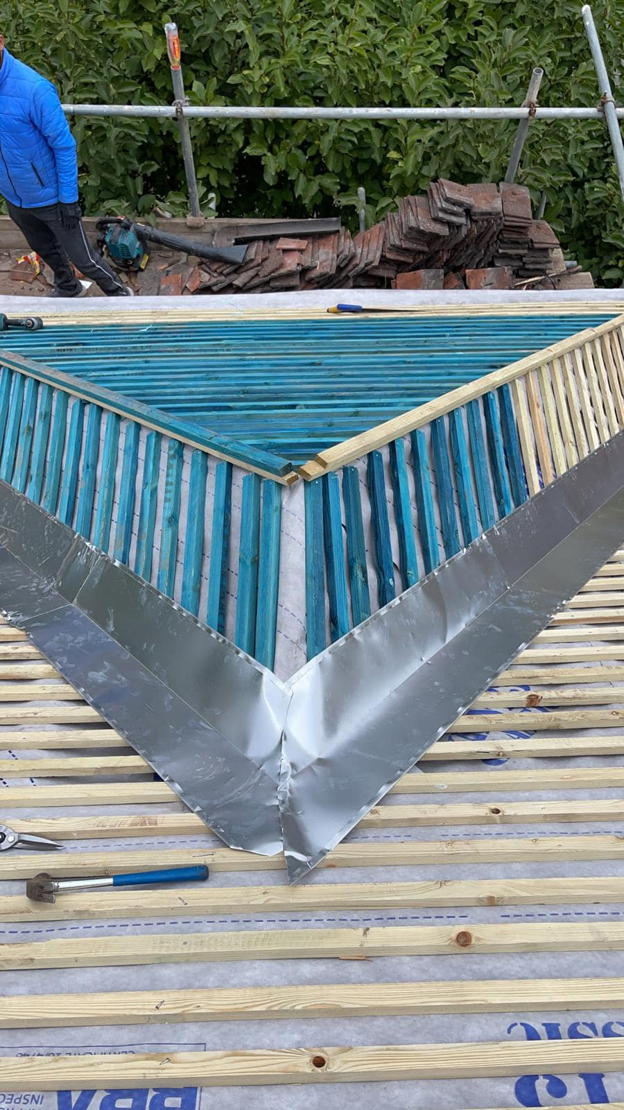 Professional roofers working on a property in London - KS Roof Master
