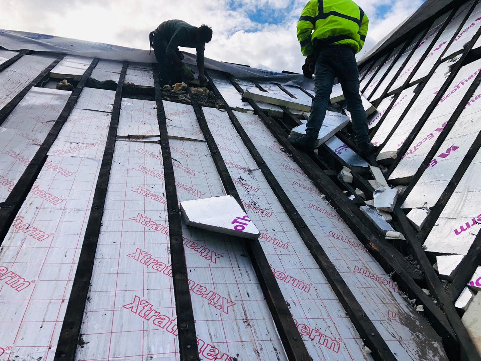 Professional roofers working on a property in London - KS Roof Master