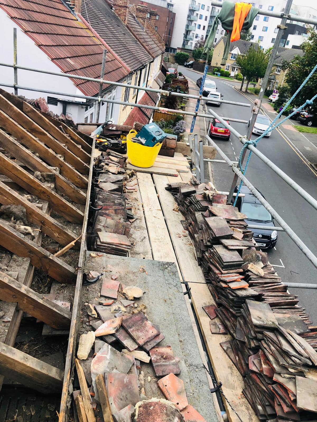 Professional roofers working on a property in London - KS Roof Master