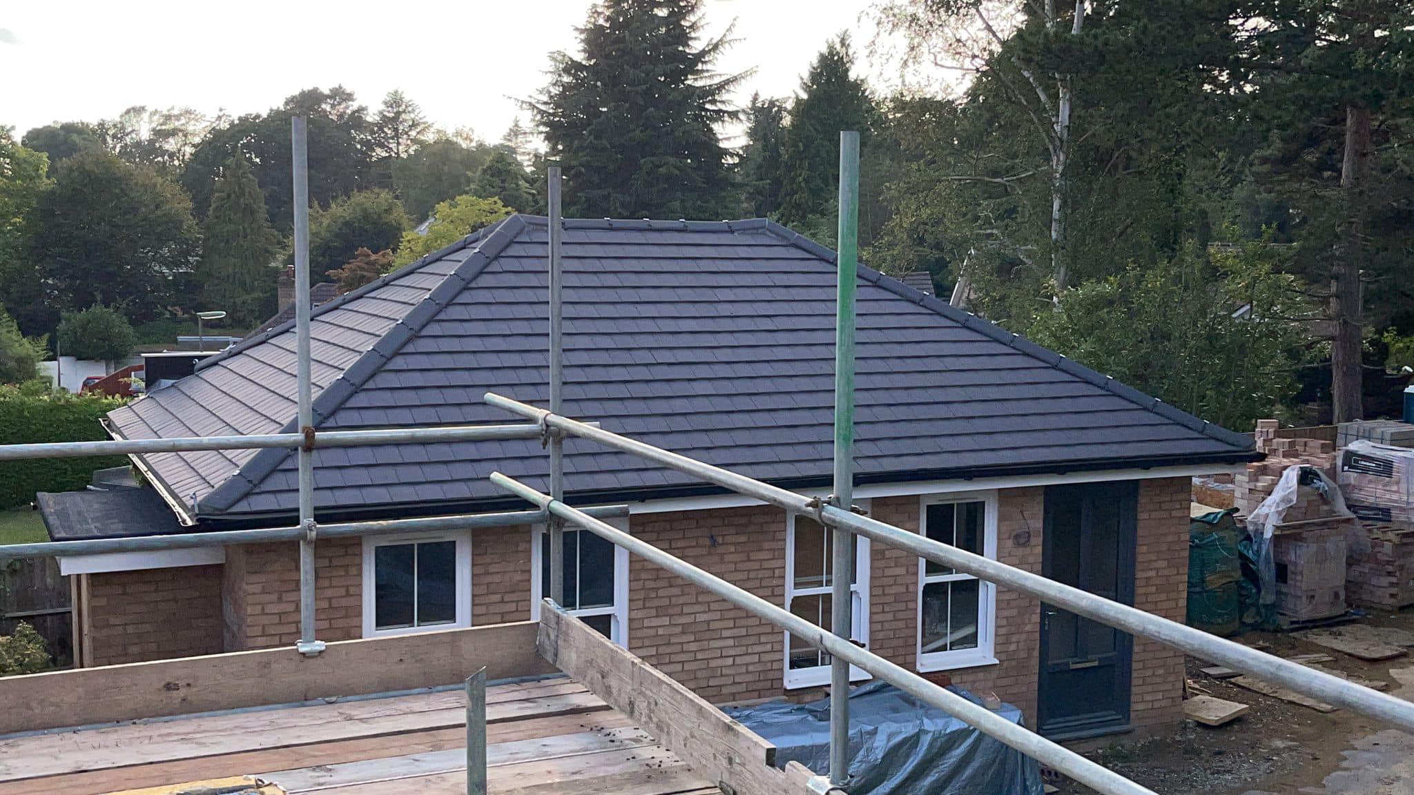 Professional roofers working on a property in London - KS Roof Master