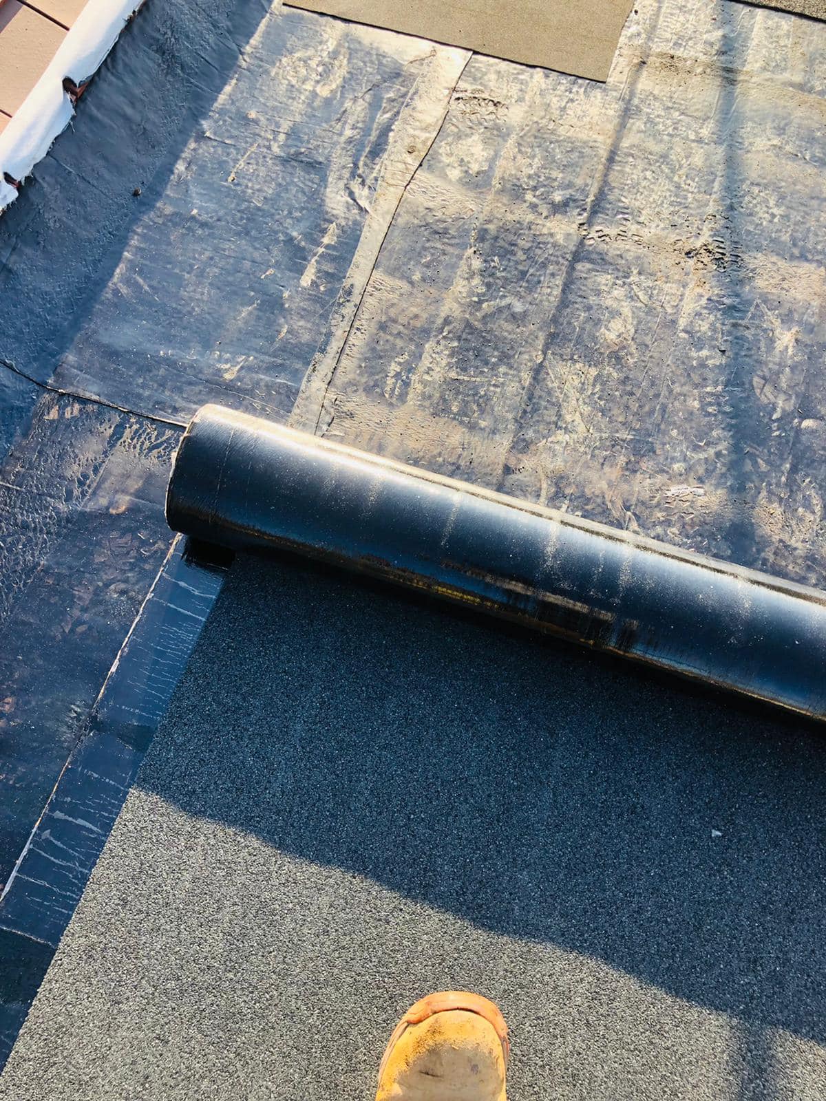 Professional roofers working on a property in London - KS Roof Master