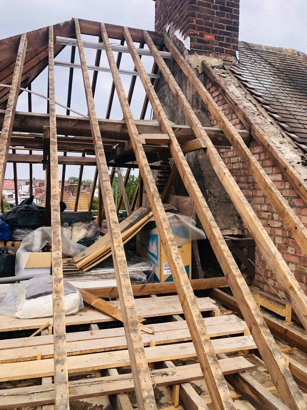 Professional roofers working on a property in London - KS Roof Master