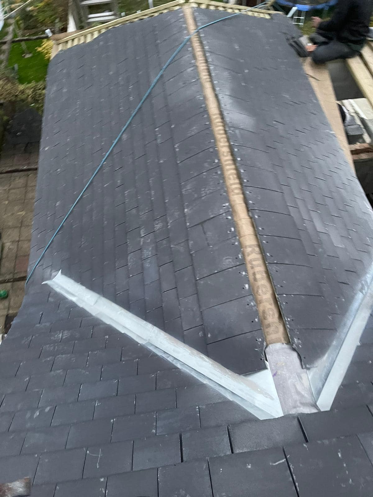 Professional roofers working on a property in London - KS Roof Master
