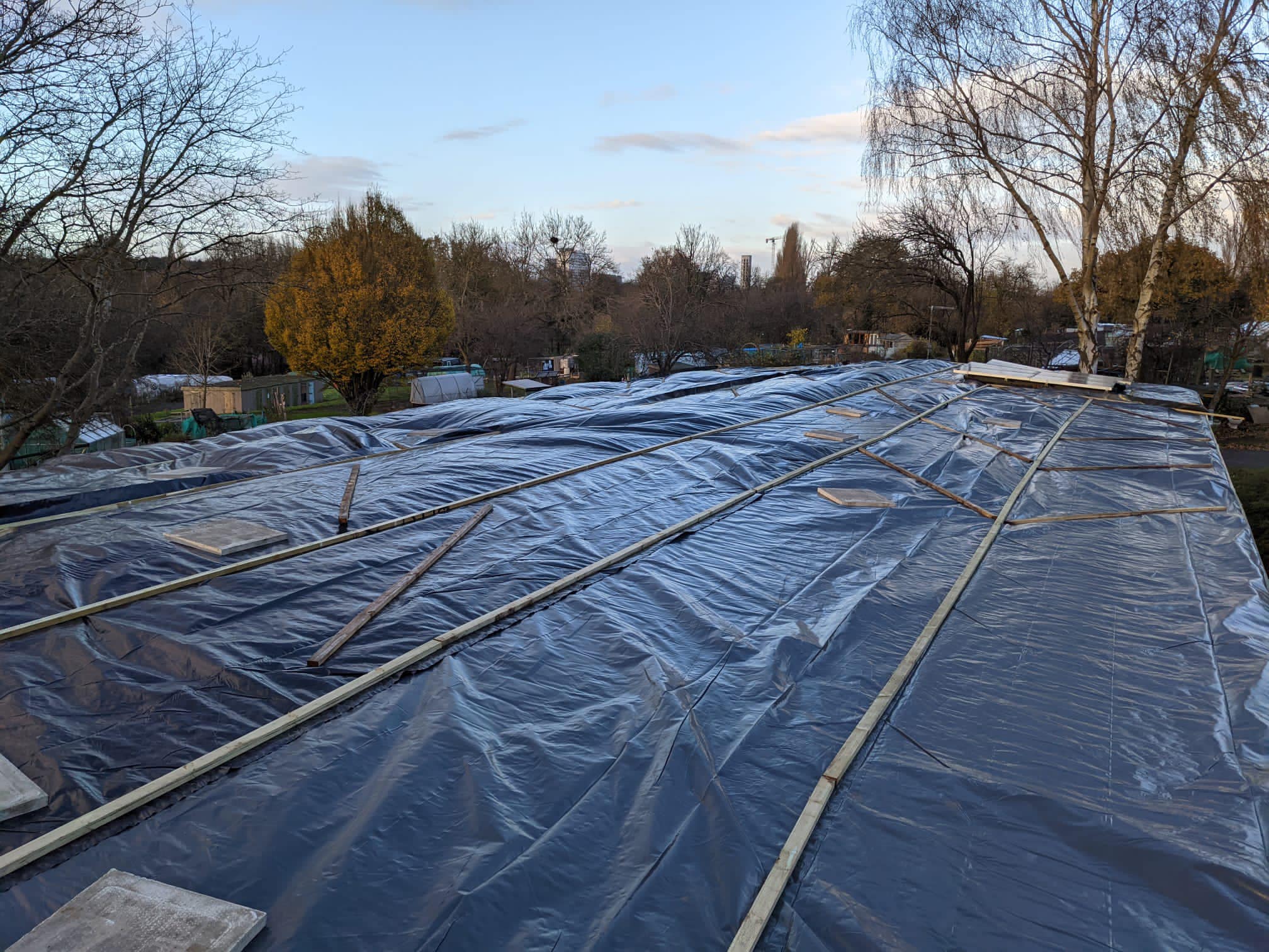 Professional roofers working on a property in London - KS Roof Master