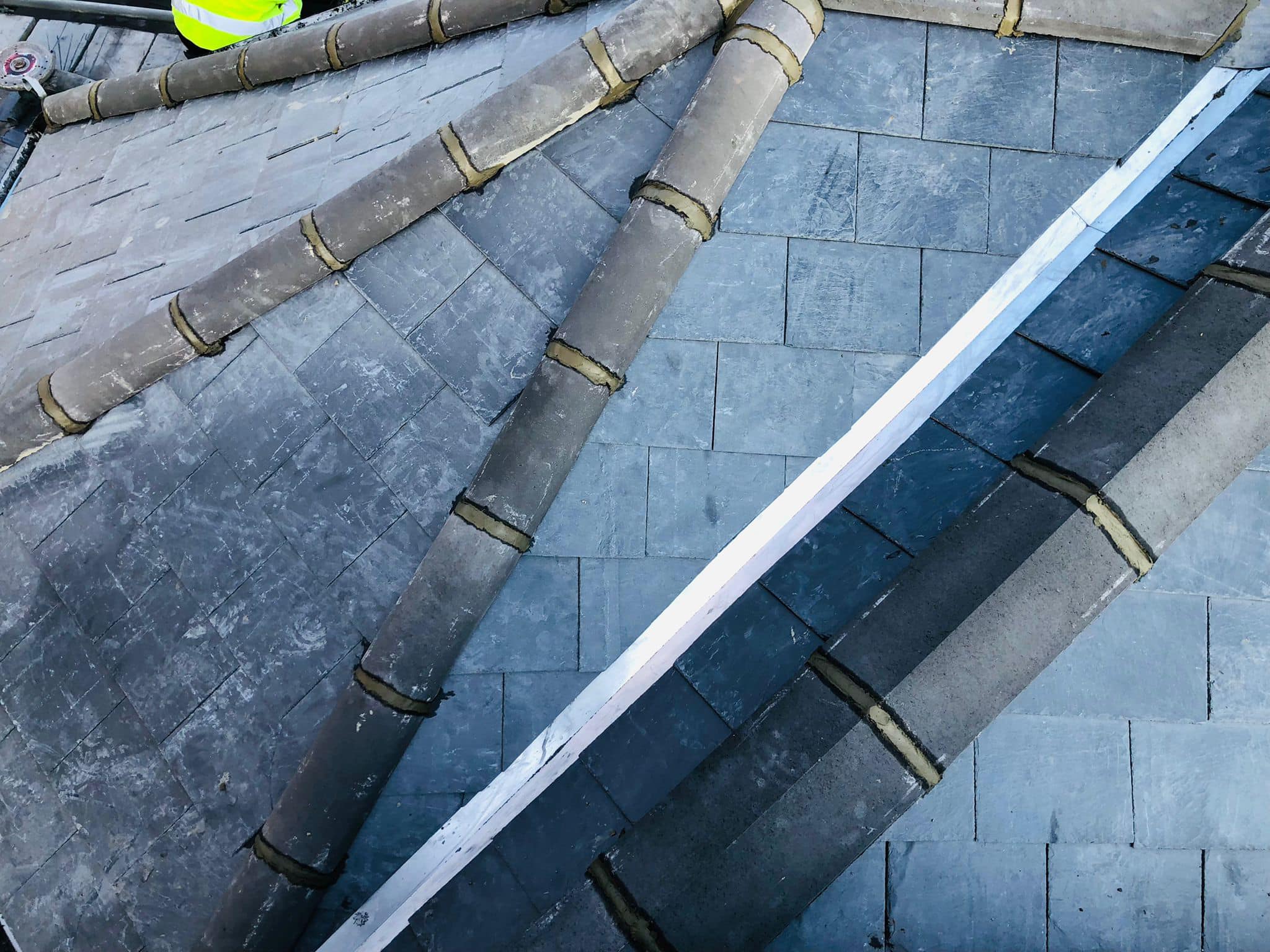 Professional roofers working on a property in London - KS Roof Master