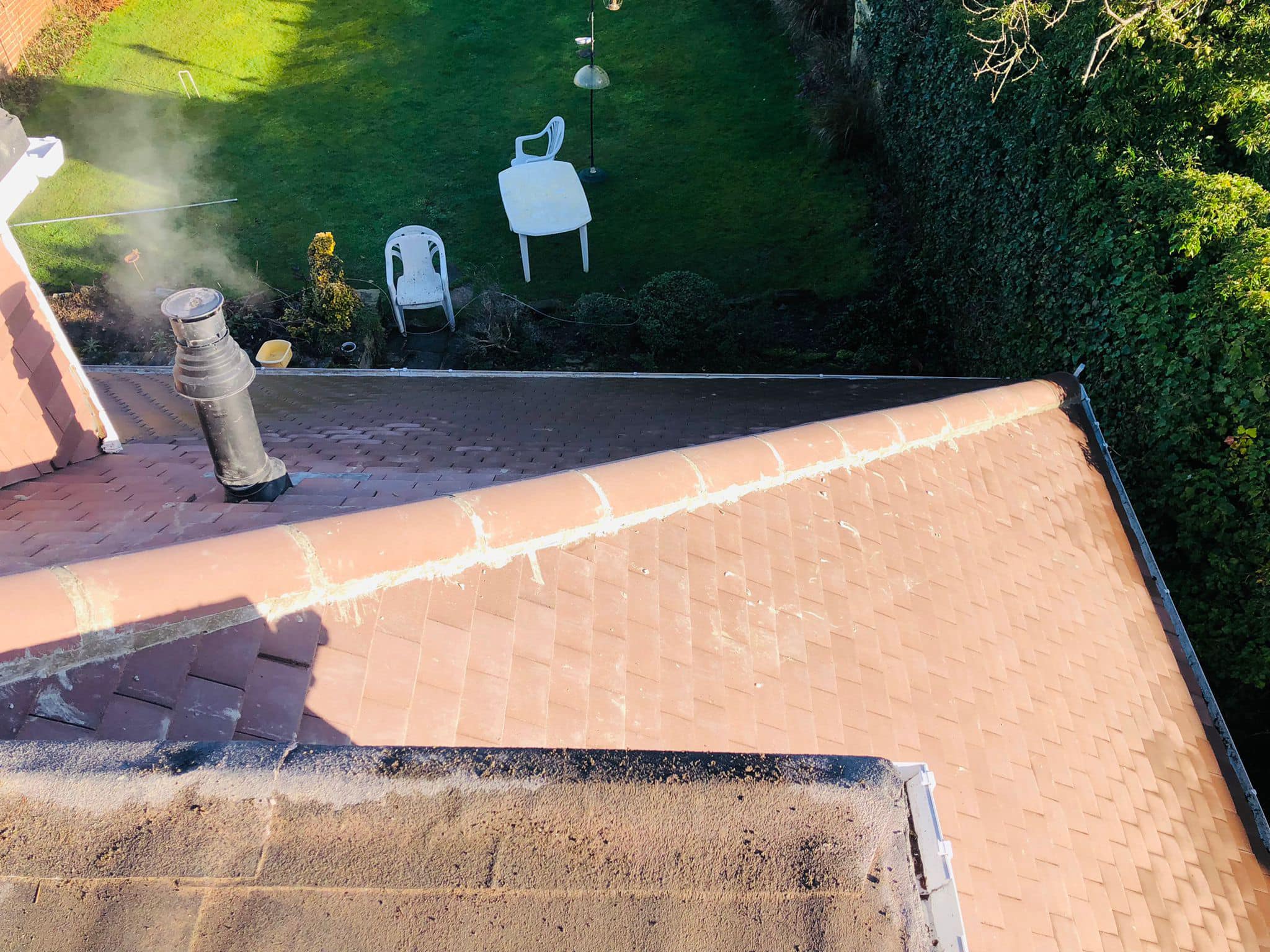 Professional roofers working on a property in London - KS Roof Master