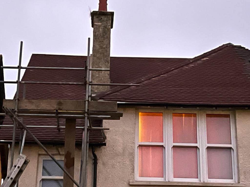 Professional roofers working on a property in London - KS Roof Master