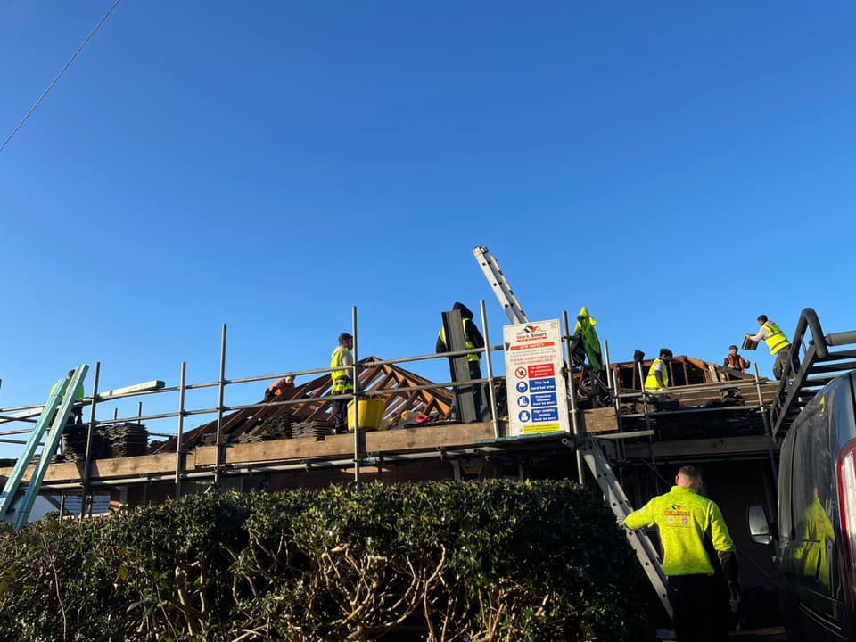 Professional roofers working on a property in London - KS Roof Master