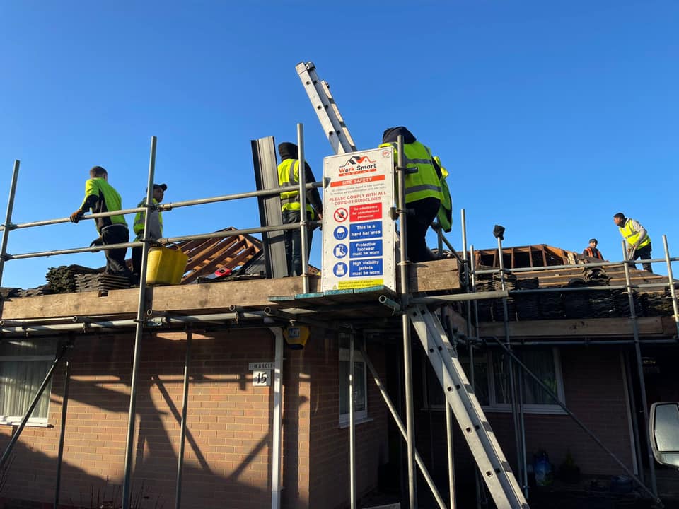 Professional roofers working on a property in London - KS Roof Master