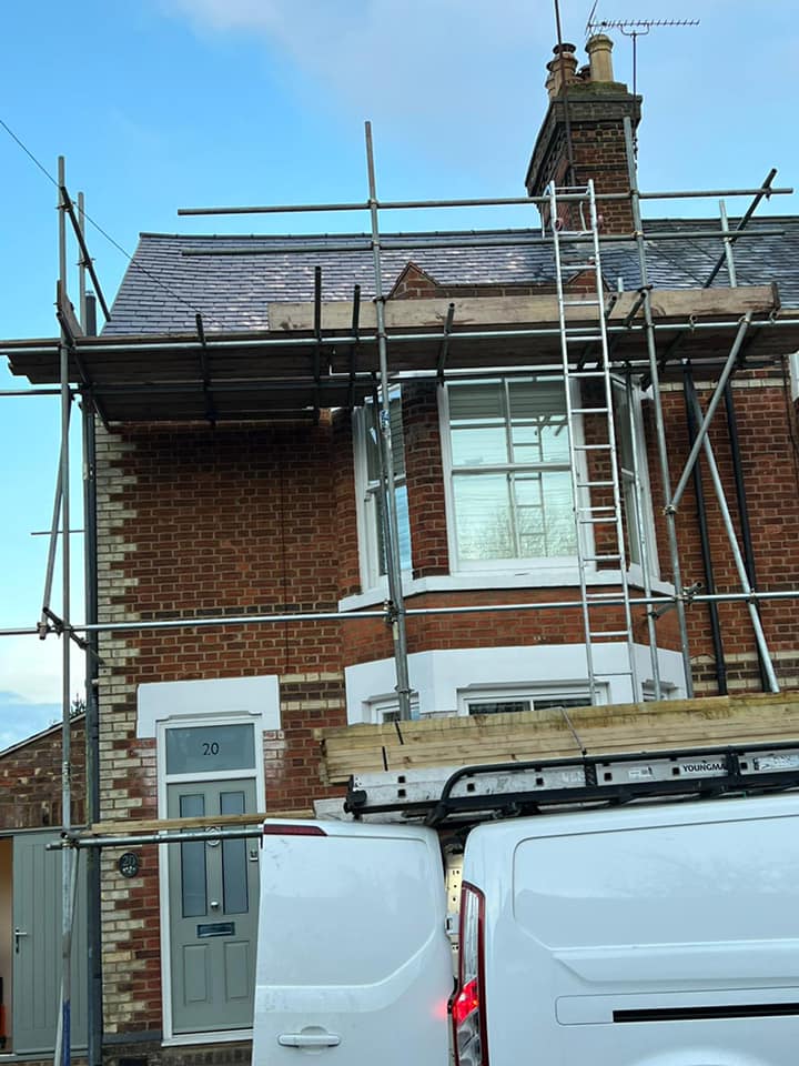 Professional roofers working on a property in London - KS Roof Master