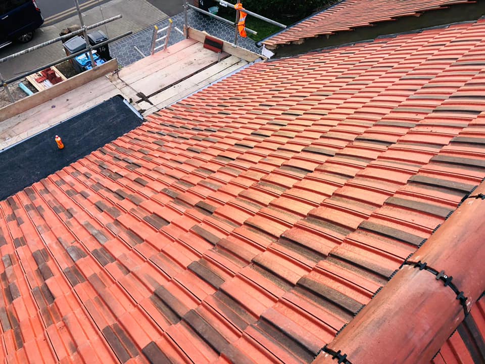 Professional roofers working on a property in London - KS Roof Master