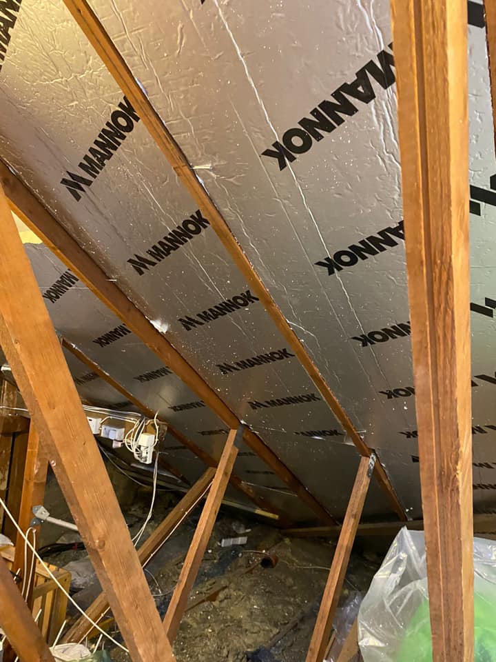 Professional roofers working on a property in London - KS Roof Master