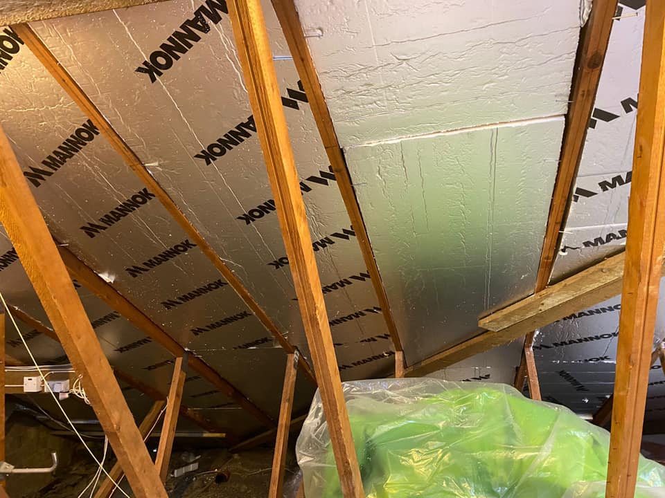 Professional roofers working on a property in London - KS Roof Master