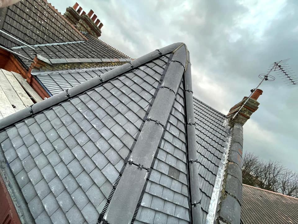 Professional roofers working on a property in London - KS Roof Master