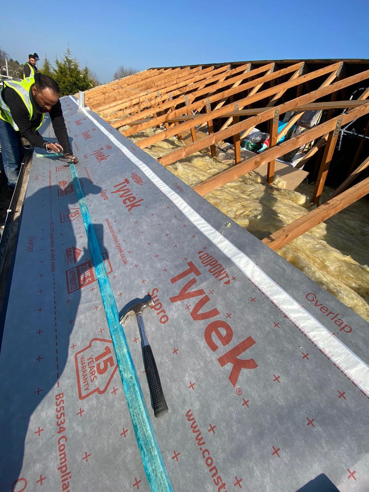 Professional roofers working on a property in London - KS Roof Master