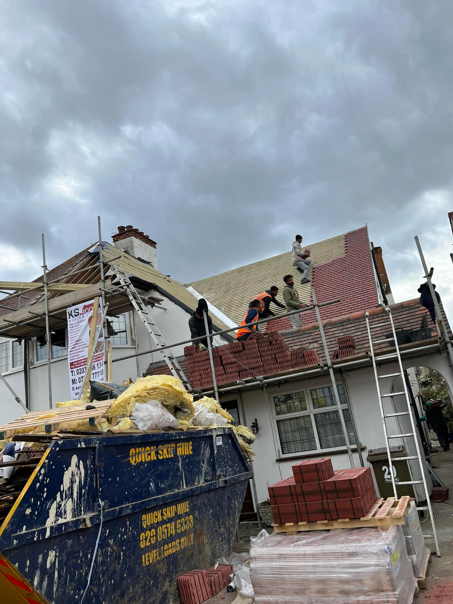 Professional roofers working on a property in London - KS Roof Master