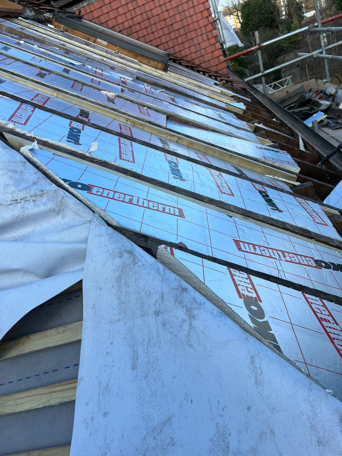 Professional roofers working on a property in London - KS Roof Master
