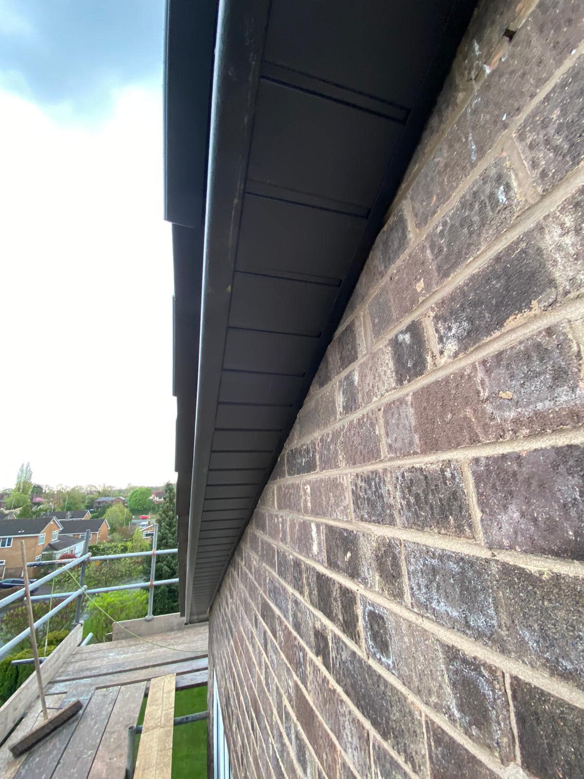 Professional roofers working on a property in London - KS Roof Master