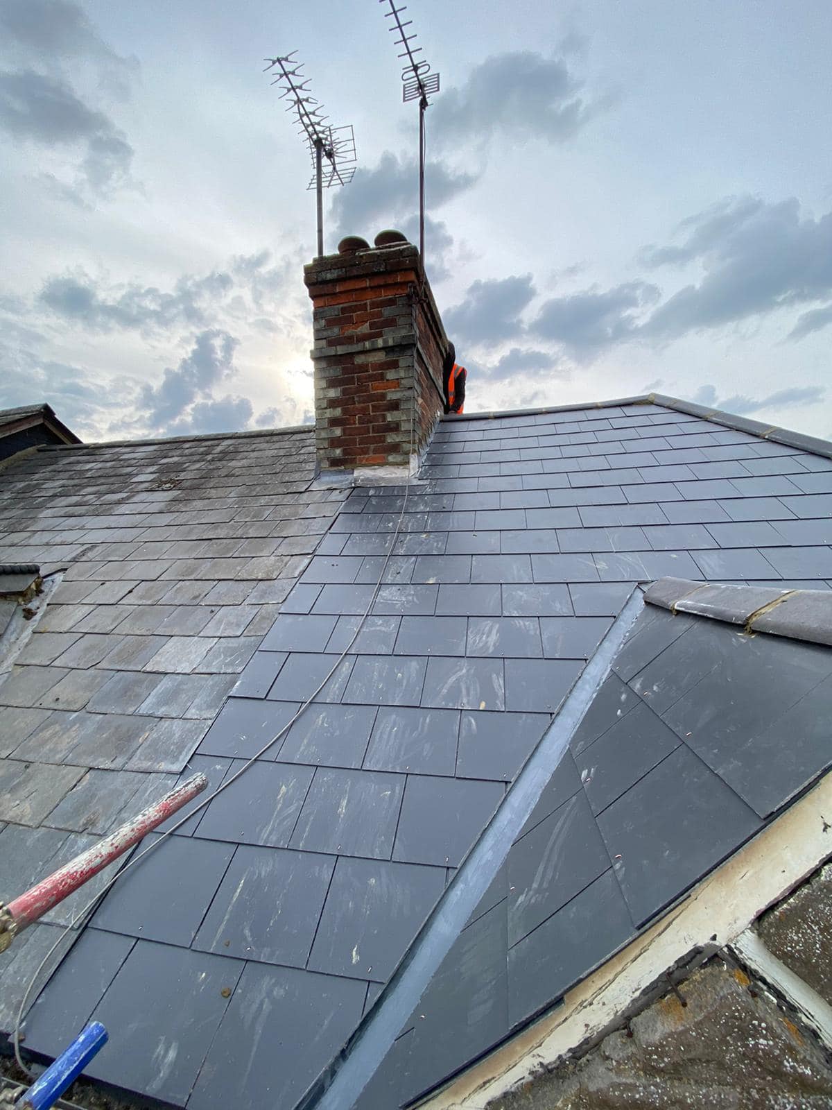 Professional roofers working on a property in London - KS Roof Master