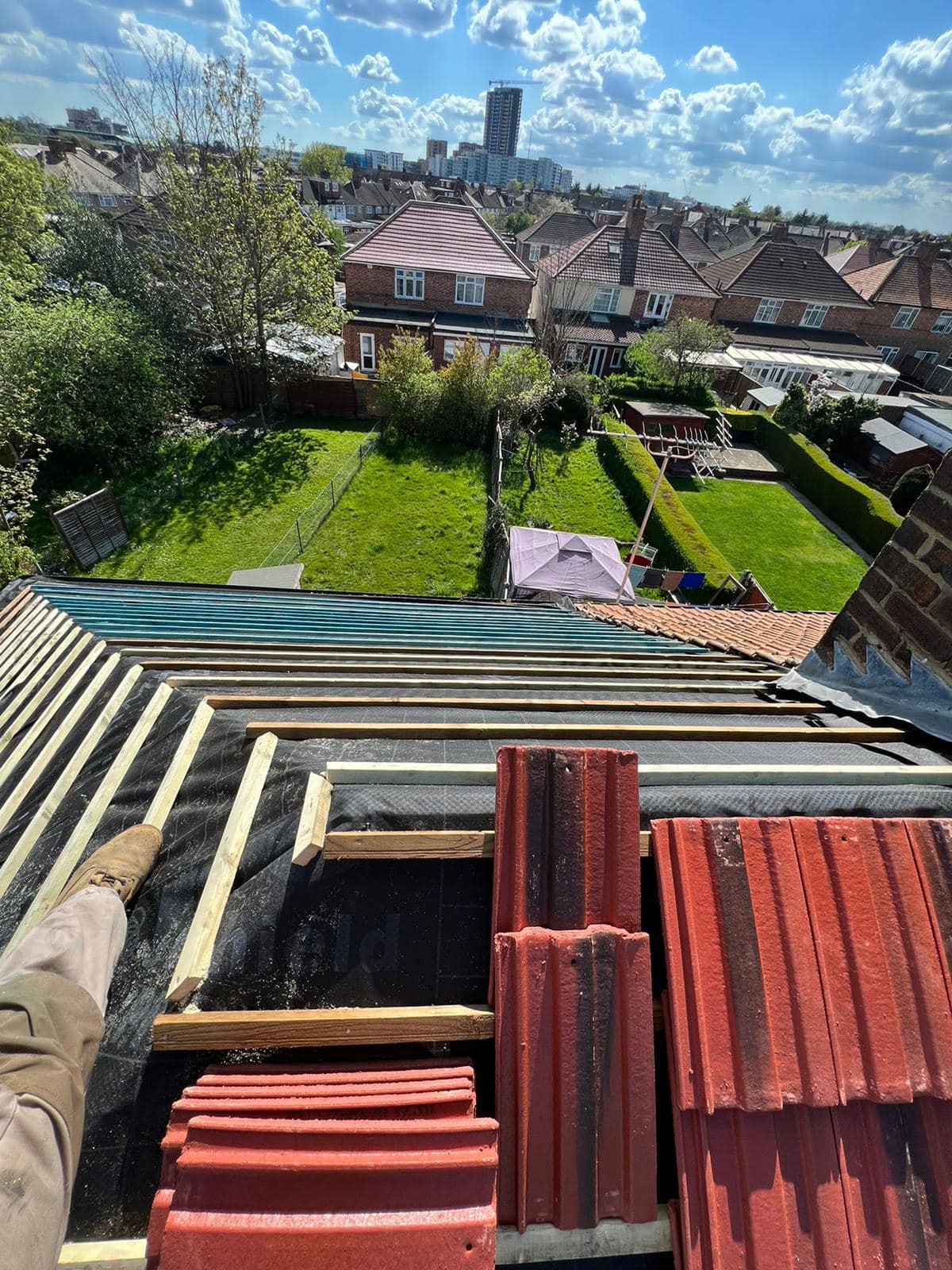 Professional roofers working on a property in London - KS Roof Master