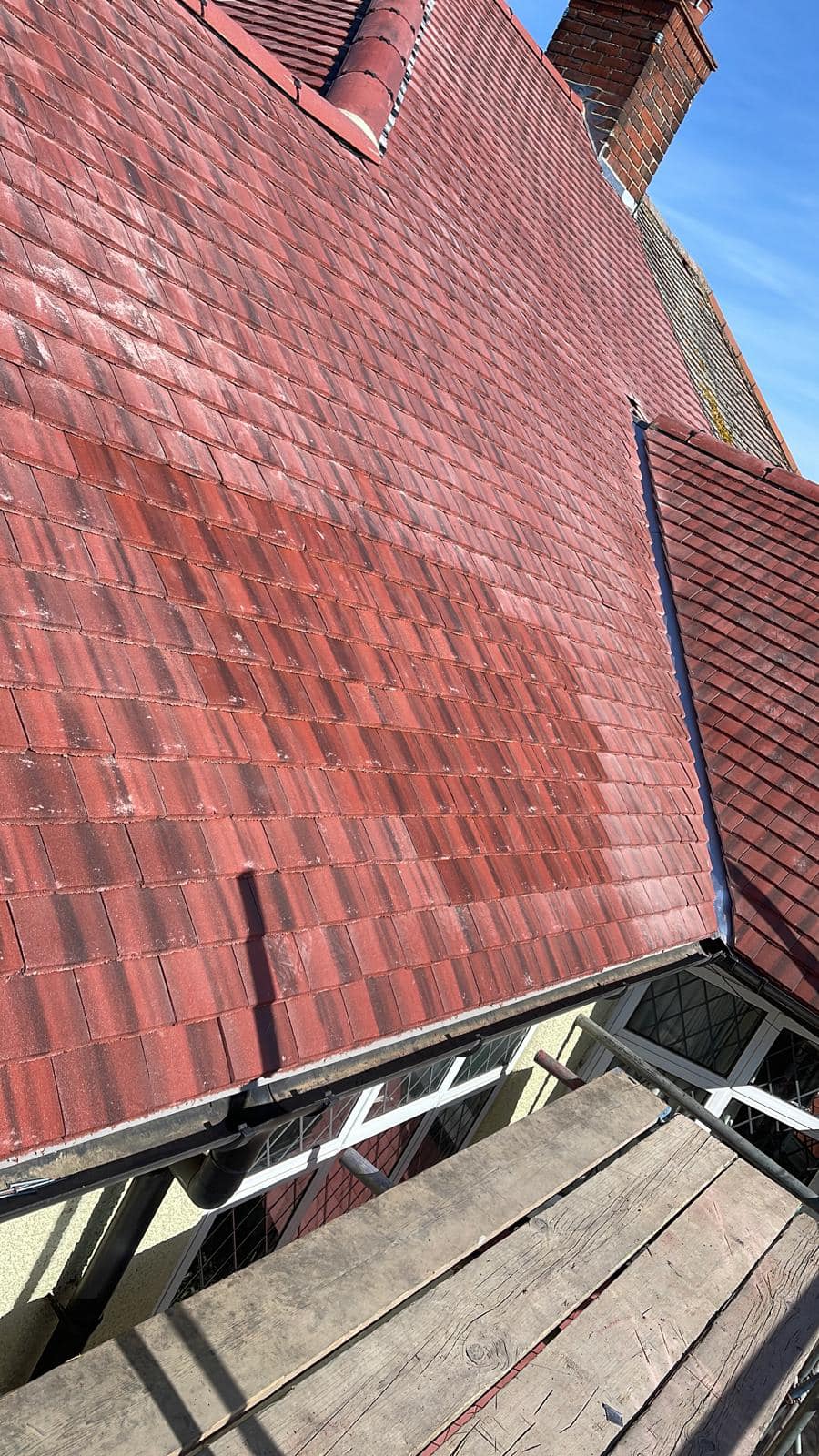 Professional roofers working on a property in London - KS Roof Master