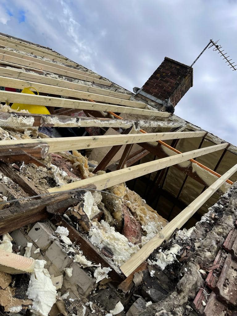 Professional roofers working on a property in London - KS Roof Master