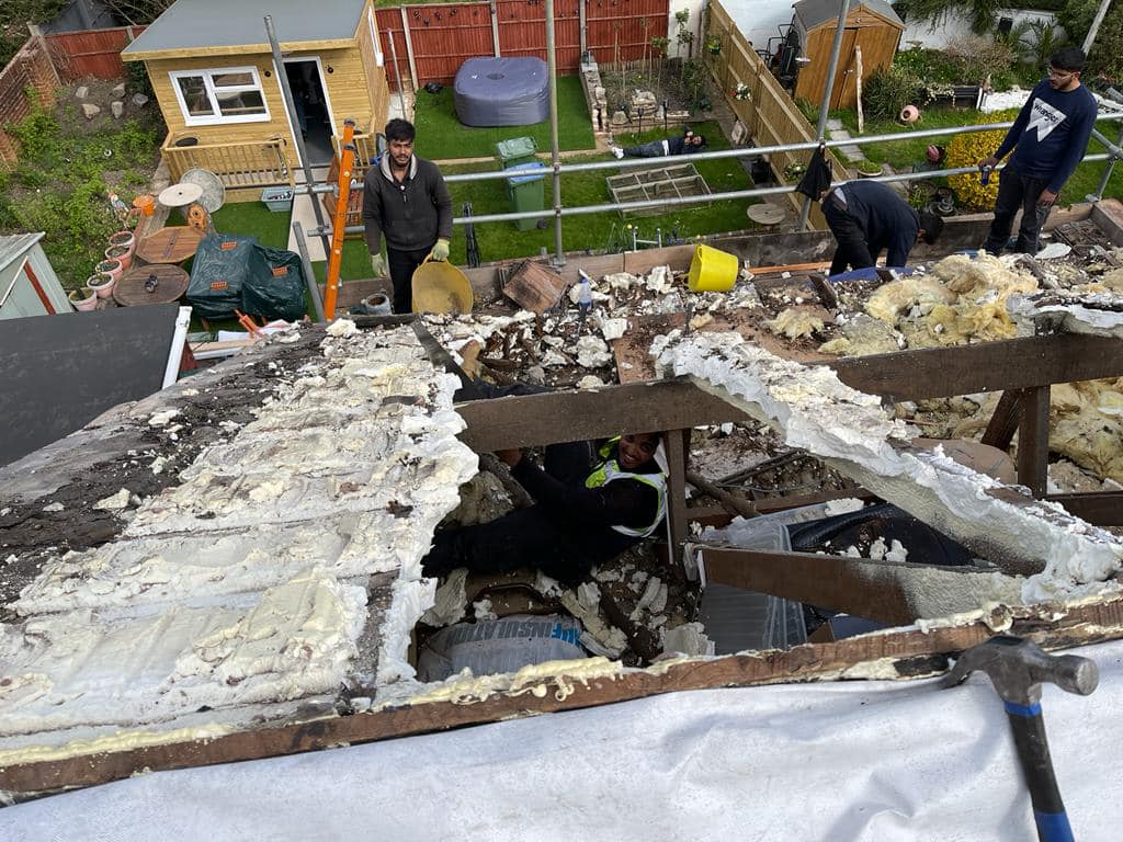 Professional roofers working on a property in London - KS Roof Master