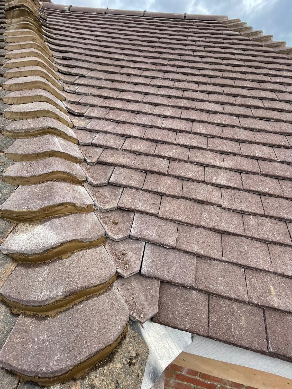 Professional roofers working on a property in London - KS Roof Master