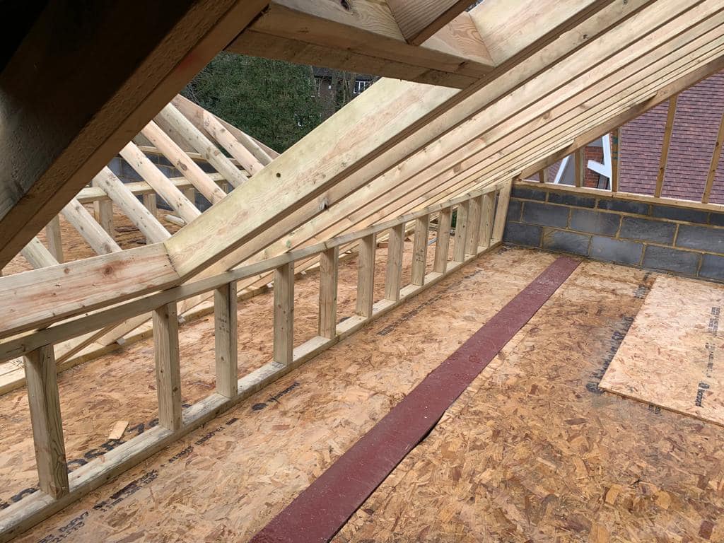 Professional roofers working on a property in London - KS Roof Master