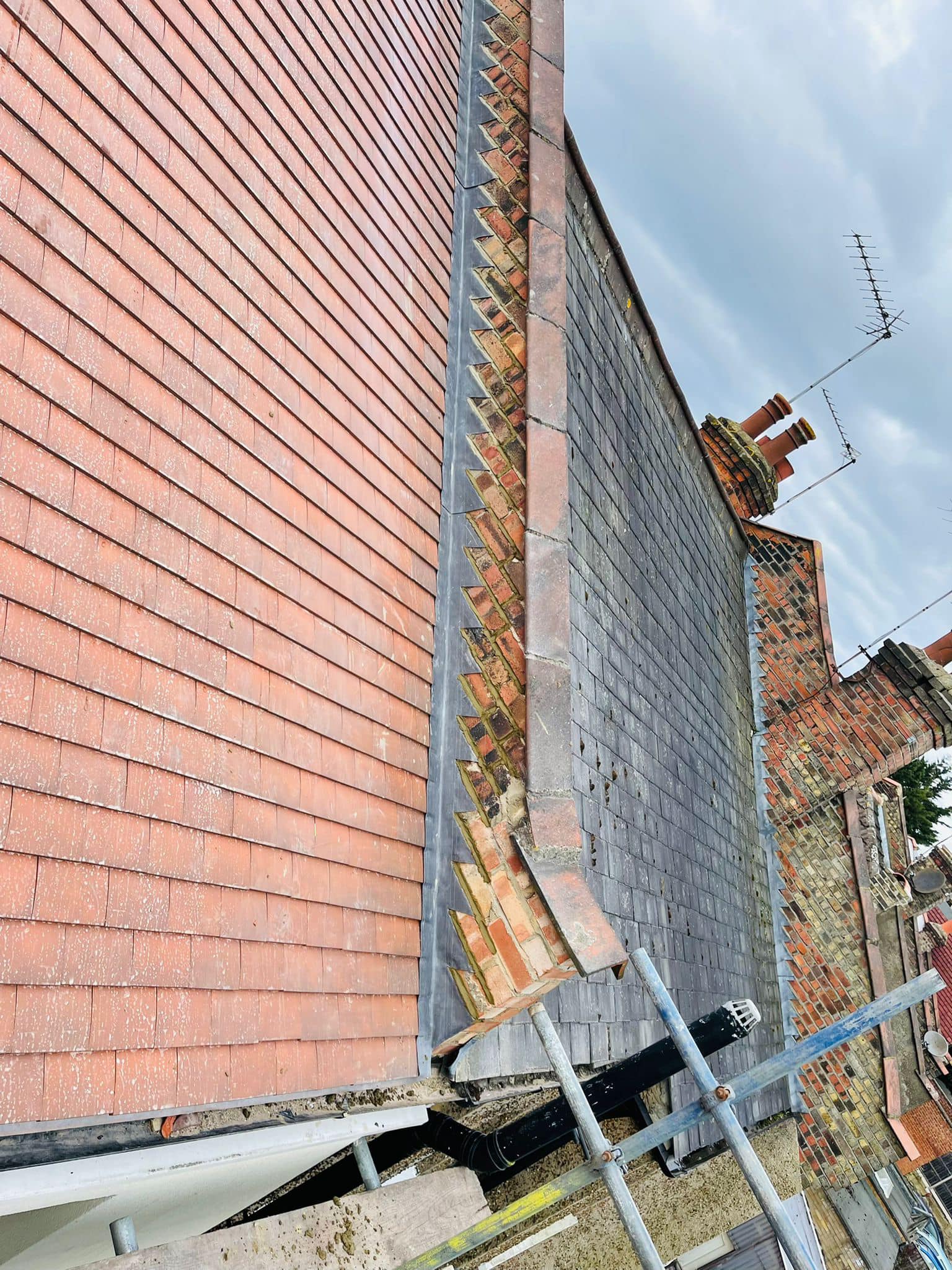 Professional roofers working on a property in London - KS Roof Master