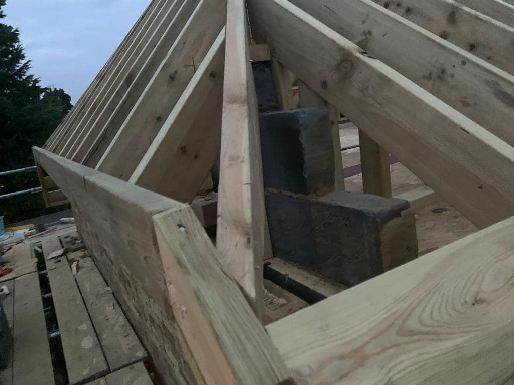Professional roofers working on a property in London - KS Roof Master