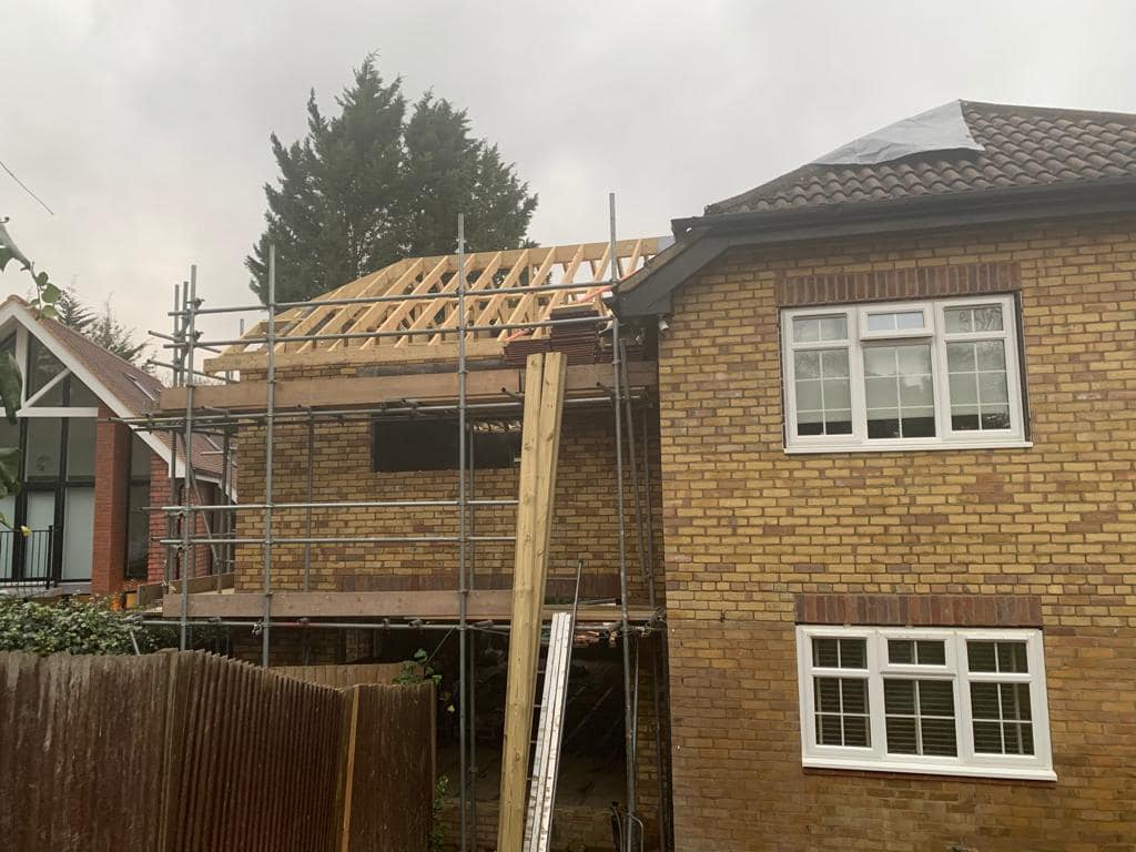 Professional roofers working on a property in London - KS Roof Master