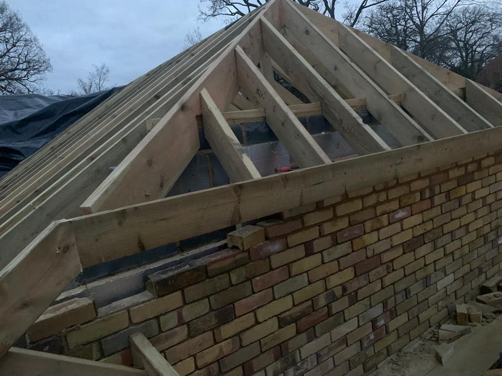 Professional roofers working on a property in London - KS Roof Master