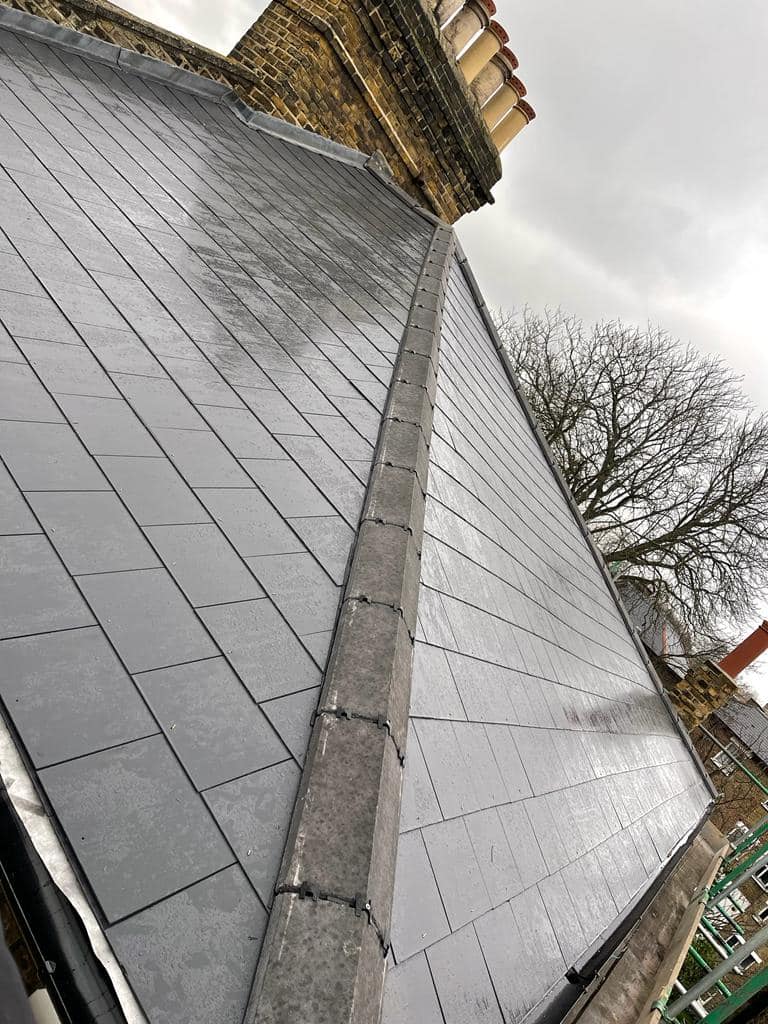 Professional roofers working on a property in London - KS Roof Master