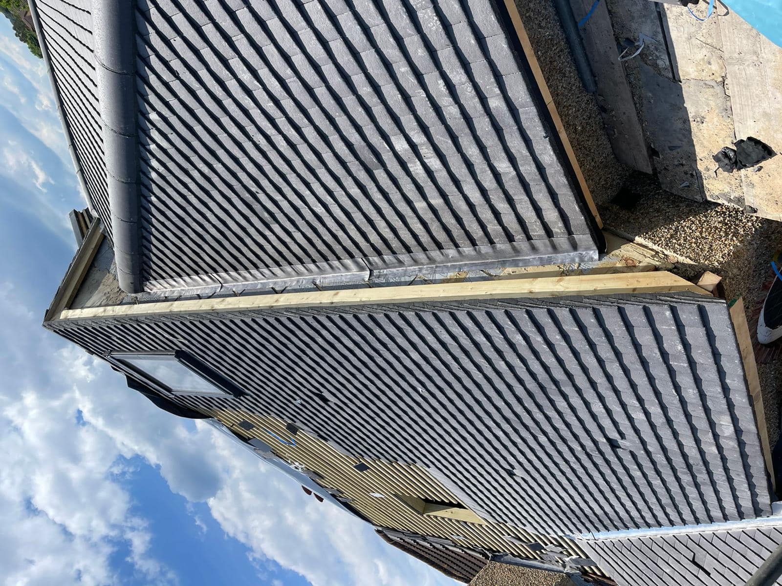 Professional roofers working on a property in London - KS Roof Master